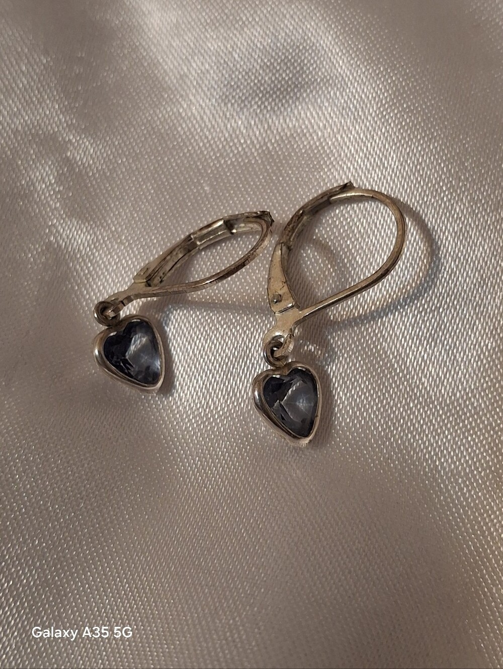 Blue topaz heart shaped stones set in sterling silver